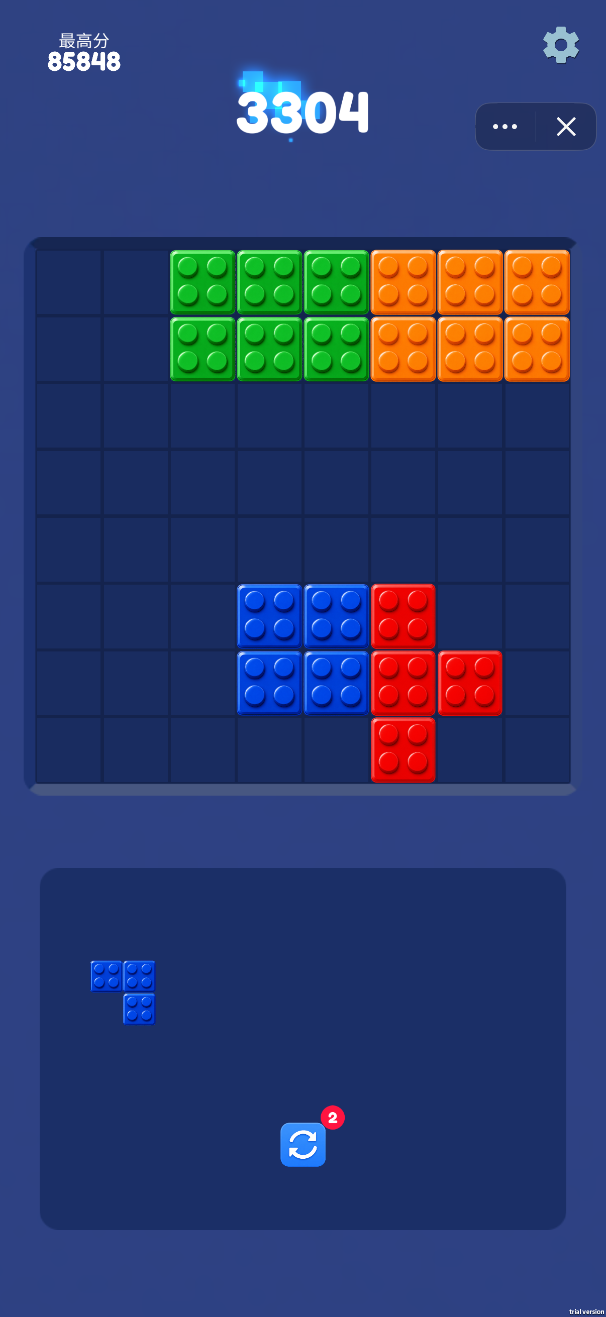 The score screen shows 3304 points, a best score of 85848 and an L-shaped piece waiting in the tray. Compare its footprint with the open cells before placing it.