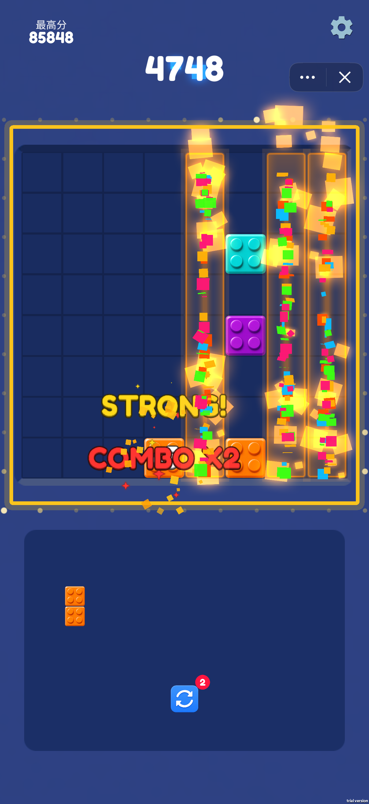 Several columns clear together while STRONG! and COMBO ×2 appear. Plan around nearly complete lines to create room and keep the next placement available.